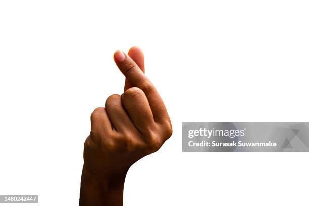 mini heart hand sign on white background. - finger stock-fotos und bilder