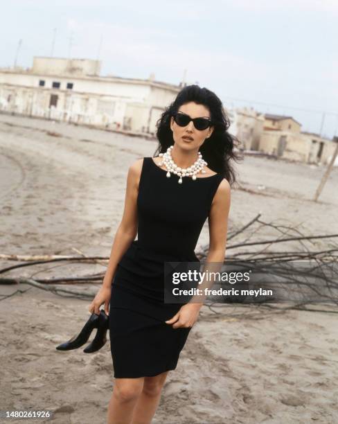 Italian Actress and Model Monica Bellucci on a beach in Italy.