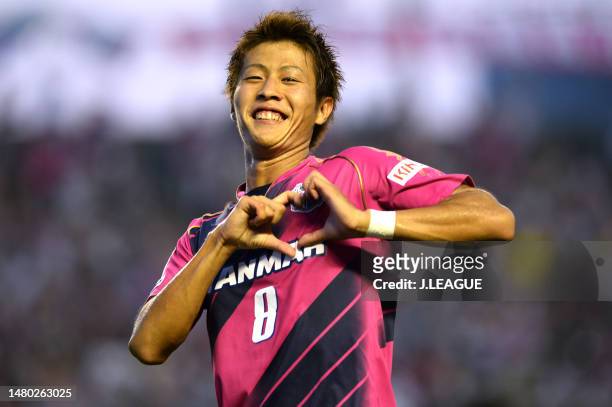 Yoichiro Kakitani of Cerezo Osaka celebrates after scoring the team's first goal during the J.League J1 match between Cerezo Osaka and Yokohama...