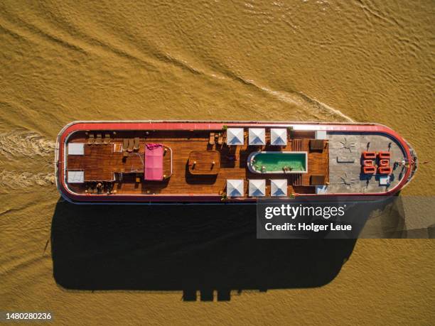 aerial of sun deck with swimming pool aboard river cruise ship anawrahta (heritage line) on chindwin river - chindwin stock pictures, royalty-free photos & images