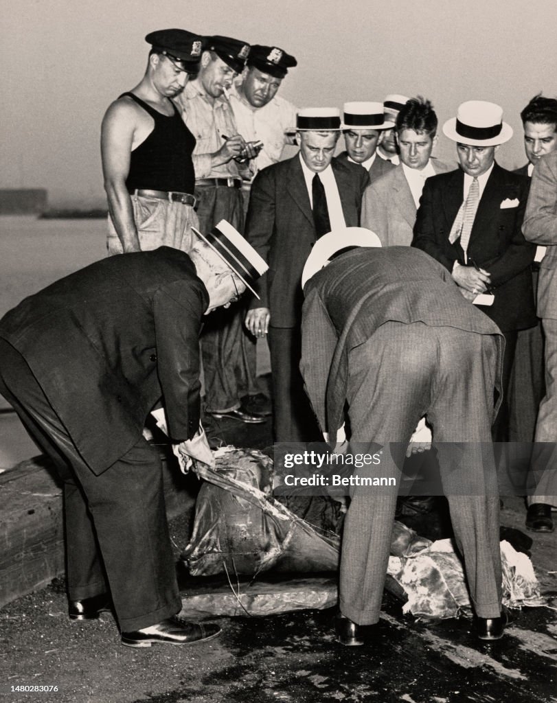 Police With Bodies Recovered From East River