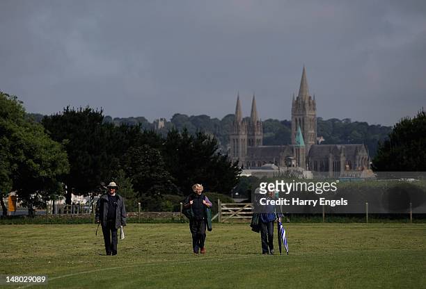 Group of spectators make their way to the cricket as Truro Cathedral is seen in the background during the 4th NatWest International One Day match...