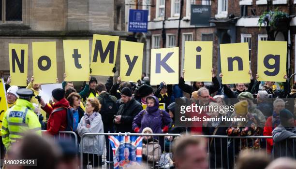 Protesters are seen ahead of the arrival King Charles III and Camilla, Queen Consort atthe Royal Maundy Service at York Minster on April 6, 2023 in...