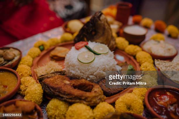 aiburo bhat ritual food arrangement bengali wedding ritual - poila baishakh stock pictures, royalty-free photos & images
