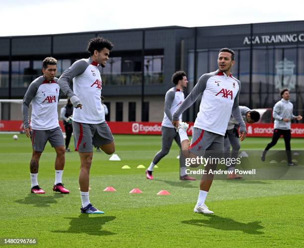 Thiago Alcantara and Luis Diaz of Liverpool during a training session at AXA Training Centre on April 06, 2023 in Kirkby, England.