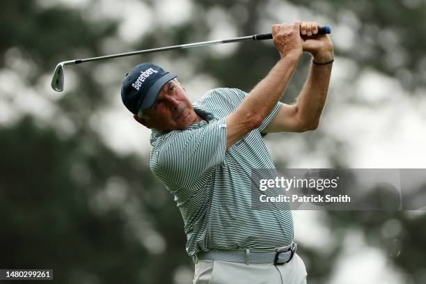 Fred Couples of the United States plays his shot from the fourth tee during the first round of the 2023 Masters Tournament at Augusta National Golf...