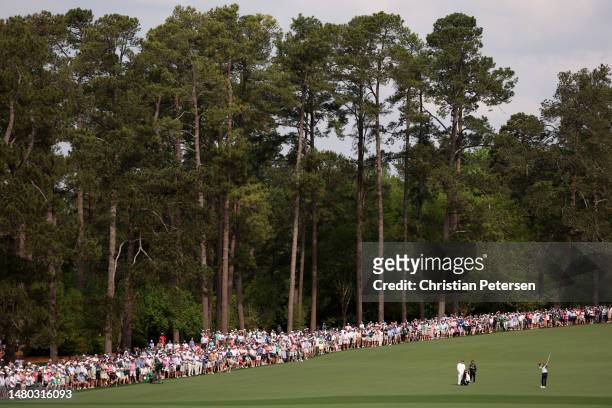 Tiger Woods of the United States plays a shot on the second hole during the first round of the 2023 Masters Tournament at Augusta National Golf Club...