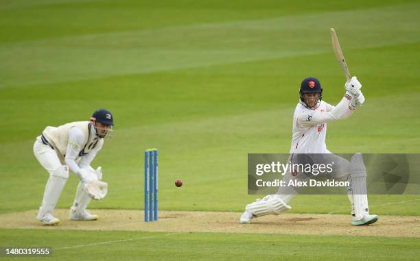 Tom Westley of Essex hits runs watched on by John Simpson of Middlesex during the LV= Insurance County Championship Division 1 match between...