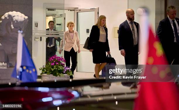 European Commission President Ursula von der Leyen, centre, and members of her entourage leave after a press conference at the European Delegation on...