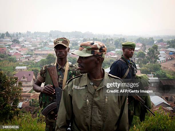 Colonel Sultani Makenga , head of the rebel M23 group, walks on a hill in Bunagana, a town near the Ugandan border, on July 8, 2012. Colonel Sultani...