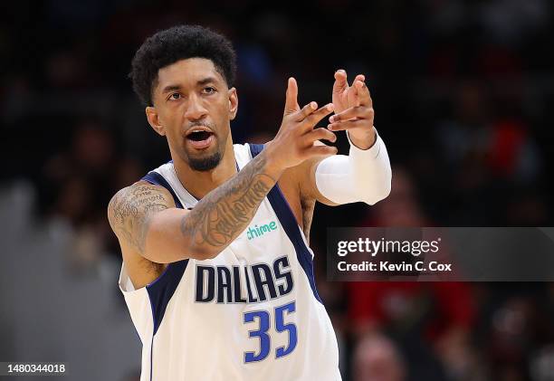 Christian Wood of the Dallas Mavericks drives against the Atlanta Hawks during overtime at State Farm Arena on April 02, 2023 in Atlanta, Georgia....