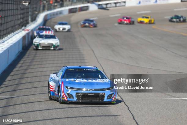 Kyle Larson, driver of the Hendrickcars.com Chevrolet, speeds down the backstretch during the NASCAR Cup Series Toyota Owners 400 at Richmond Raceway...