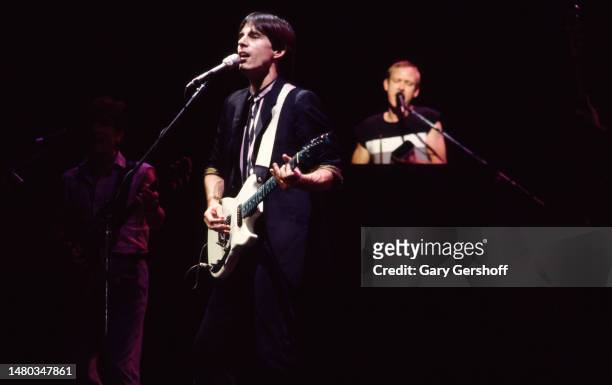 American Rock and Pop musician Jackson Browne plays electric guitar as he performs, with his band, during the 'Lawyers in Love' tour at Madison...