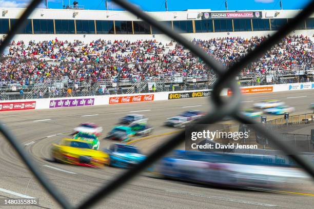 Cars speed around turn two during the NASCAR Cup Series Toyota Owners 400 at Richmond Raceway on April 02, 2023 in Richmond, Virginia.