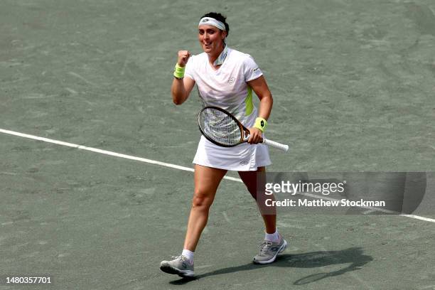 Ons Jabeur of Tunisia celebrates match point against Caroline Colehide during the Credit One Charleston Open at Credit One Stadium on April 06, 2023...