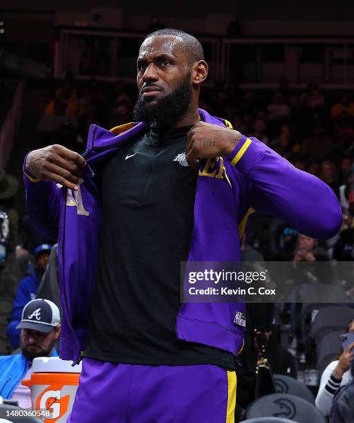LeBron James of the Los Angeles Lakers looks on during player introductions prior to facing the Atlanta Hawks at State Farm Arena on December 30,...