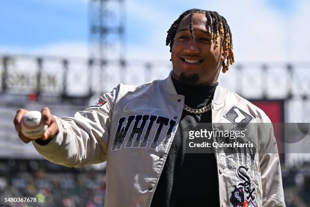 Trevis Gipson of the Chicago Bears prepares to throw a ceremonial first pitch before the game between the Chicago White Sox and the San Francisco...