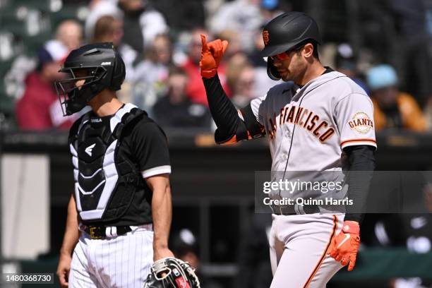 Blake Sabol of the San Francisco Giants reacts after his home run in the second inning against the Chicago White Sox at Guaranteed Rate Field on...