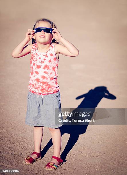 young girl wearing safety glasses - solar eclipse glasses stock pictures, royalty-free photos & images