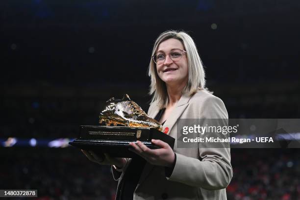 Ellen White, former England players poses for a photo with a Golden Boot award as England Women's all time leading goal scorer during the Women´s...