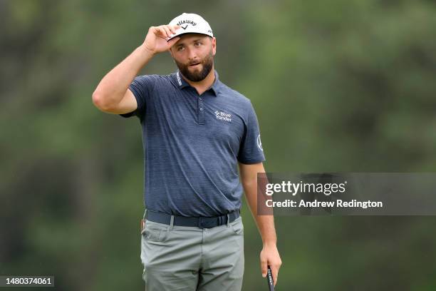 Jon Rahm of Spain reacts after finishing on the 18th green during the first round of the 2023 Masters Tournament at Augusta National Golf Club on...