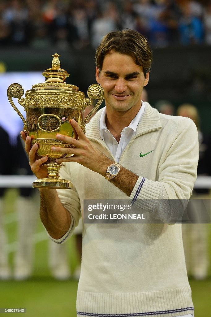 Switzerland's Roger Federer celebrates w