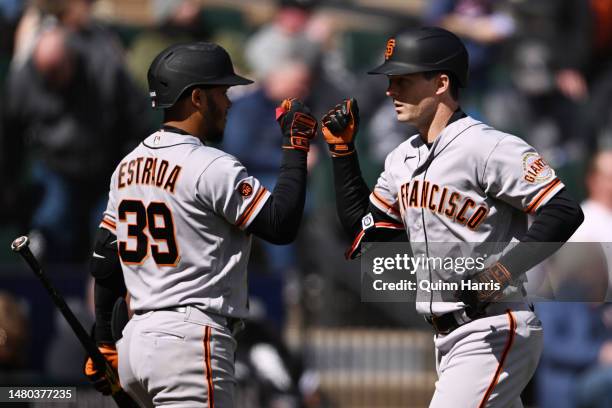 Thairo Estrada and Mike Yastrzemski of the San Francisco Giants celebrate after the two run home run in the fifth inning against the Chicago White...