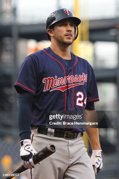 Trevor Plouffe of the Minnesota Twins looks on against the Pittsburgh Pirates on June 20, 2012 at PNC Park in Pittsburgh, Pennsylvania. The Twins...