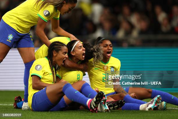 Andressa Alves of Brazil celebrates with teammates after scoring the team's first goal during the Women´s Finalissima 2023 match between England and...