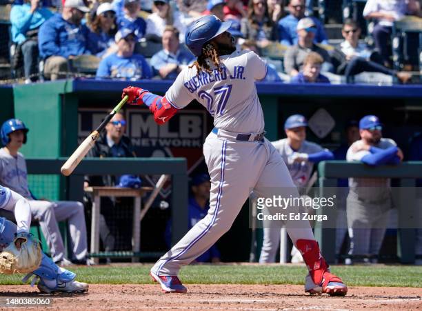 Vladimir Guerrero Jr. #27 of the Toronto Blue Jays hits a home run in the fifth inning against the Kansas City Royals at Kauffman Stadium on April...