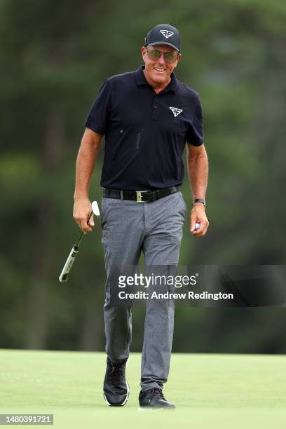 Phil Mickelson of the United States reacts on the 18th green during the first round of the 2023 Masters Tournament at Augusta National Golf Club on...
