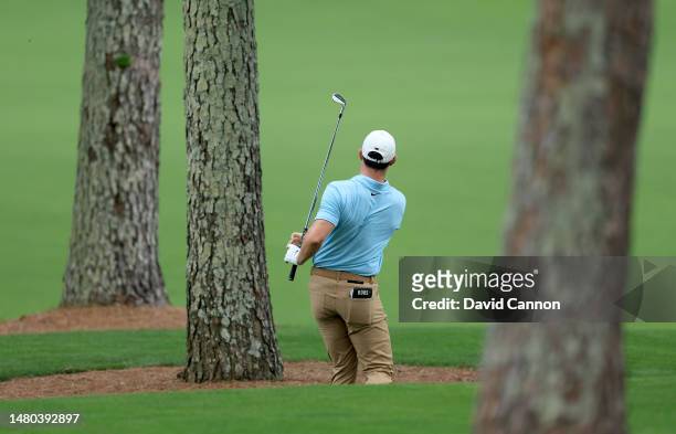 Rory McIlroy of Northern Ireland plays his second shot on the seventh hole during the first round of the 2023 Masters Tournament at Augusta National...