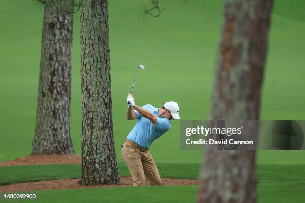 Rory McIlroy of Northern Ireland plays his second shot on the seventh hole during the first round of the 2023 Masters Tournament at Augusta National...