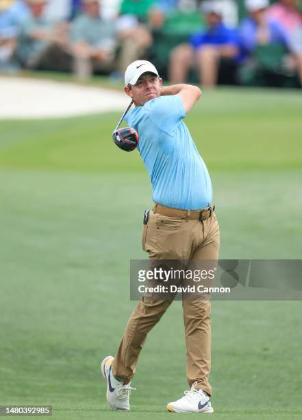 Rory McIlroy of Northern Ireland plays his tee shot on the third hole during the first round of the 2023 Masters Tournament at Augusta National Golf...