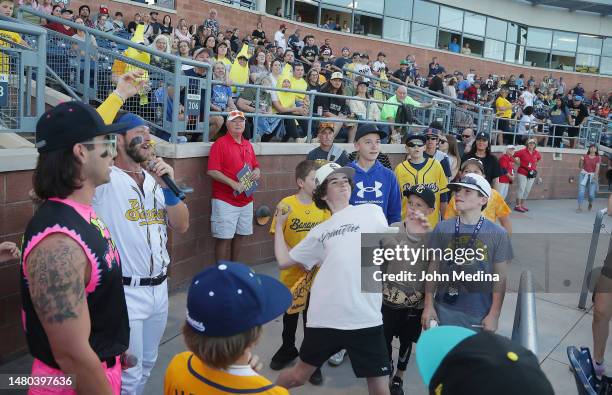 Fan tosses a baseball onto the field while the Savannah Bananas entertain a record-breaking crowd at Peoria Stadium on April 01, 2023 in Peoria,...