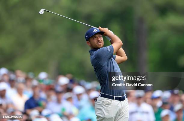 Xander Schauffele of The United States plays his tee shot on the 12th hole during the first round of the 2023 Masters Tournament at Augusta National...