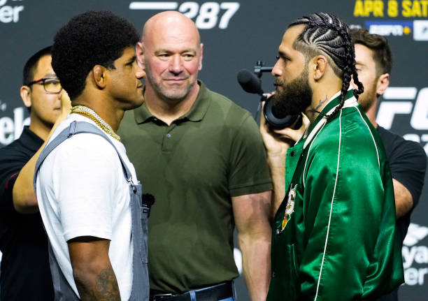 Opponents Gilbert Burns of Brazil and Jorge Masvidal face off during the UFC 287 press conference at Miami-Dade Arena on April 06, 2023 in Miami,...