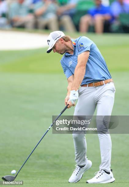 Sam Burns of The United States plays his tee shot on the third hole during the first round of the 2023 Masters Tournament at Augusta National Golf...