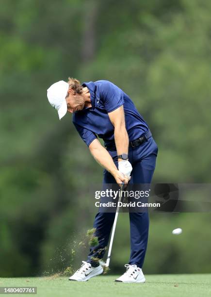 Tommy Fleetwood of England plays his second shot on the fifth hole during the first round of the 2023 Masters Tournament at Augusta National Golf...