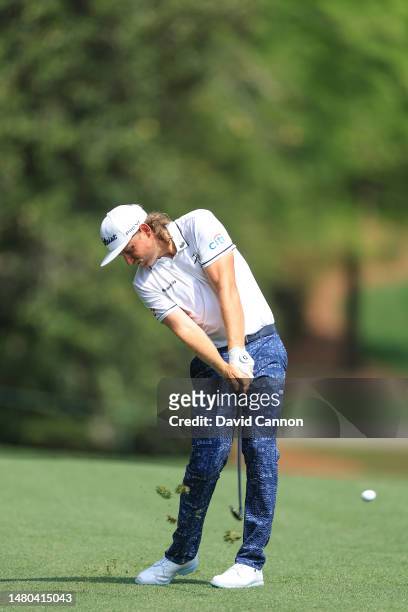 Cameron Smith of Australia plays his second shot on the fifth hole during the first round of the 2023 Masters Tournament at Augusta National Golf...