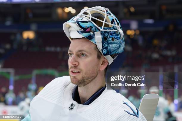Martin Jones of the Seattle Kraken looks on during warm-up prior to their NHL game against the Vancouver Canucks at Rogers Arena on April 4, 2023 in...