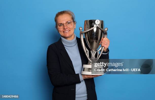 Sarina Wiegman manager of England poses with the trophy after winning the Women´s Finalissima 2023 match between England and Brazil at Wembley...