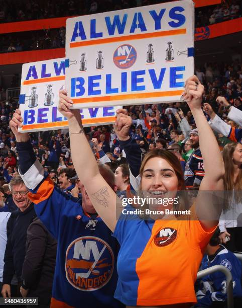 New York Islanders fans celebrate a second period goal against the Tampa Bay Lightning at the UBS Arena on April 06, 2023 in Elmont, New York.