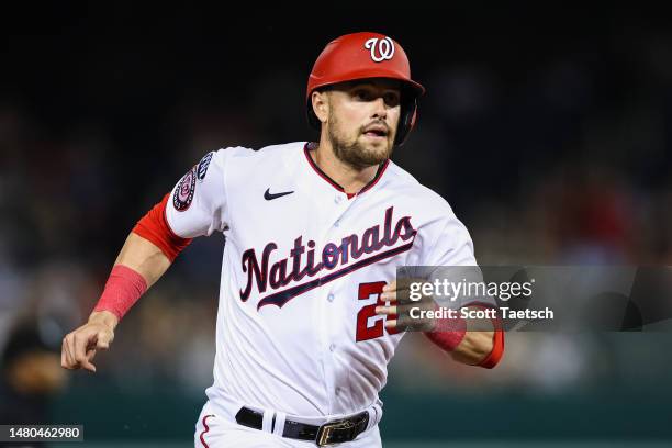 Lane Thomas of the Washington Nationals rounds second base against the Tampa Bay Rays during the sixth inning at Nationals Park on April 4, 2023 in...