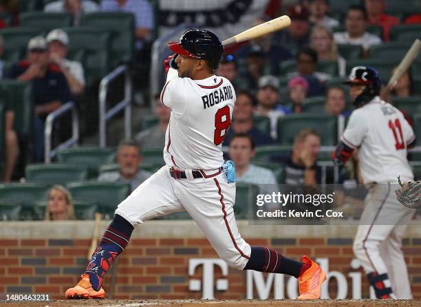 Eddie Rosario of the Atlanta Braves hits a double in the ninth inning against the San Diego Padres at Truist Park on April 06, 2023 in Atlanta,...