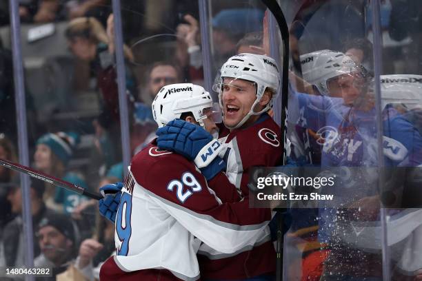 Nathan MacKinnon congratulates Mikko Rantanen of the Colorado Avalanche after Rantanen scored a goal against the San Jose Sharks in the first period...