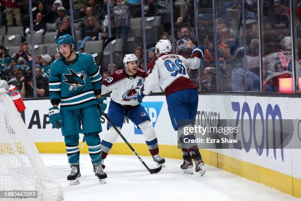 Nathan MacKinnon congratulates Mikko Rantanen of the Colorado Avalanche after Rantanen scored a goal against the San Jose Sharks in the first period...