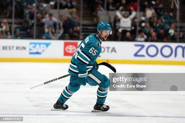 Erik Karlsson of the San Jose Sharks skates back to congratulate Steven Lorentz of the San Jose Sharks after Lorentz scored against the Colorado...