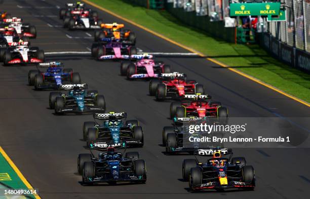 Max Verstappen of the Netherlands driving the Oracle Red Bull Racing RB19 leads George Russell of Great Britain driving the Mercedes AMG Petronas F1...