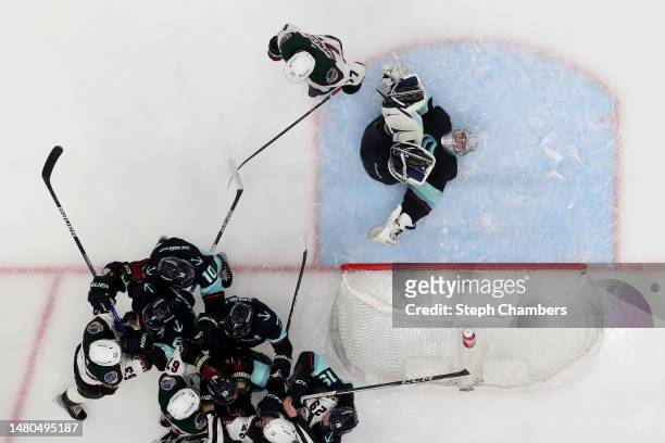 Philipp Grubauer of the Seattle Kraken reacts after making a save against the Arizona Coyotes at Climate Pledge Arena on April 06, 2023 in Seattle,...